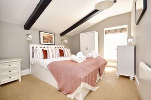 Bedroom One- click for photo gallery